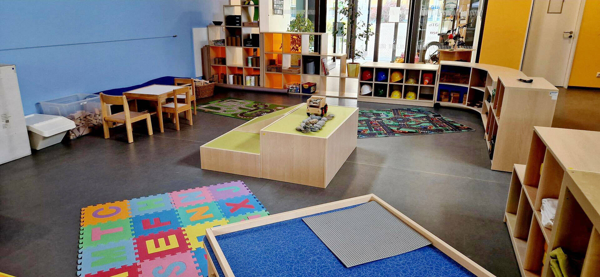Play area with various building toys